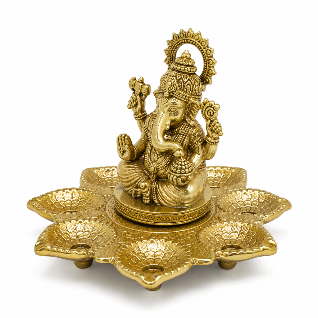 GANESH WITH GOLD POOJA DIYA