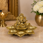 GANESH WITH GOLD POOJA DIYA