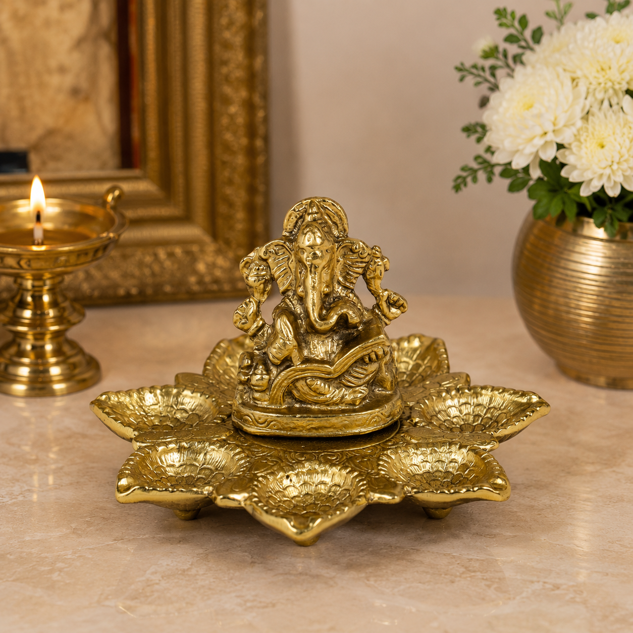 GANESH WITH GOLD POOJA DIYA