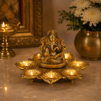 GANESH WITH GOLD POOJA DIYA