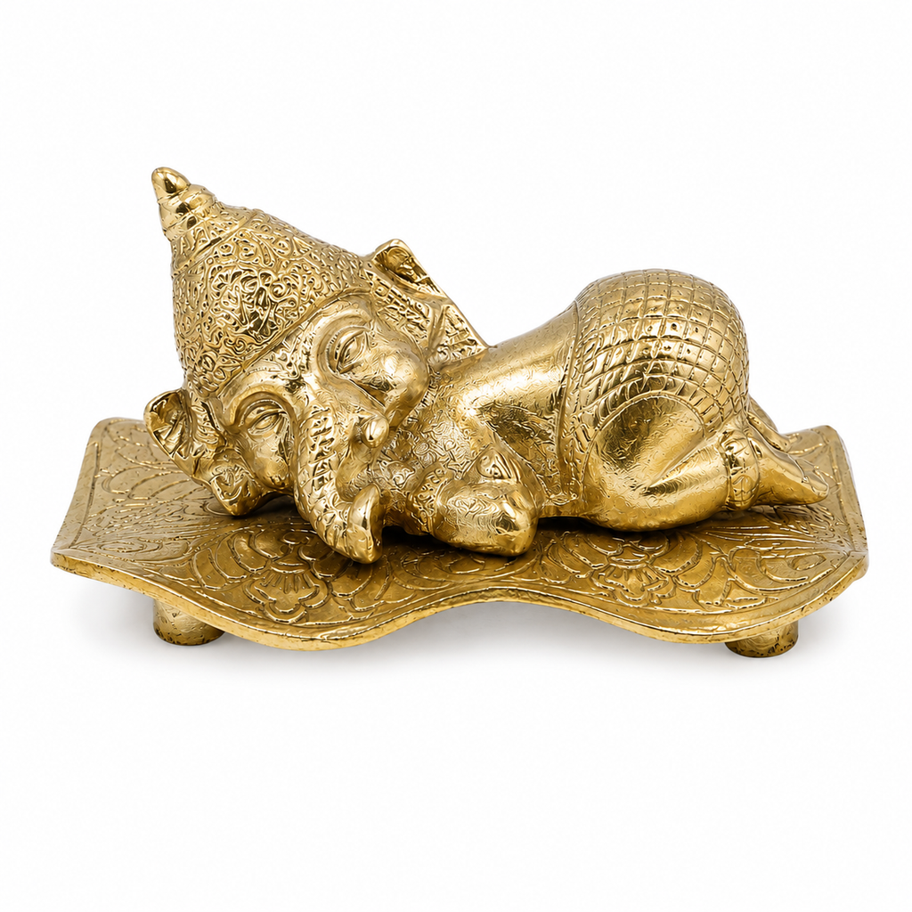SLEEPING BABY GANESH ON LEAF